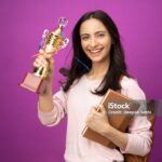 Young student woman isolated purple background
